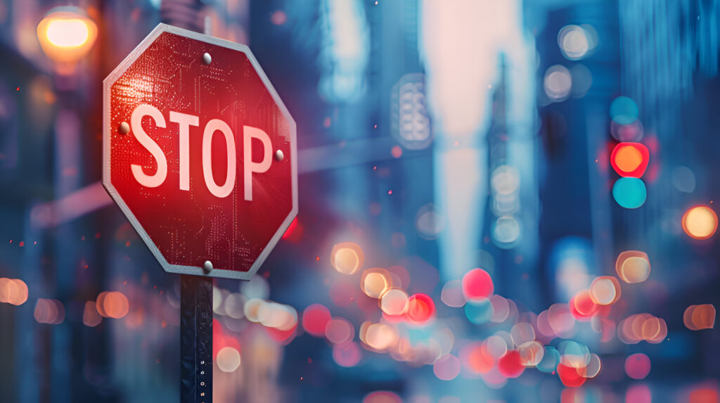 Defocused stop sign traffic regulations with traffic lights on the street, increase law enforcement