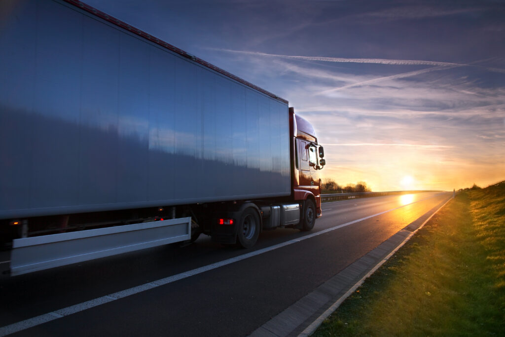 Red truck at sunset